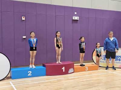 <<🎉Grade 4 IP Si Yi Wins Medals at All Hong Kong Inter-Schools Gymnastics Competition!🤸‍♀️>>